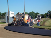 Asphalt base construction. | Track Surface Services